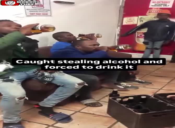Video :The store owner has the robbers consume all of the wine they have taken